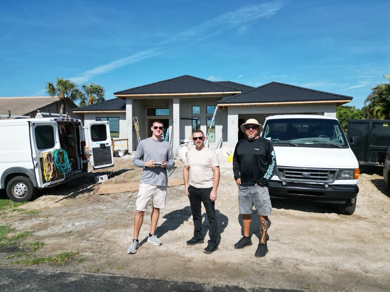 EBM Development team on construction site — SW Florida custom home builder